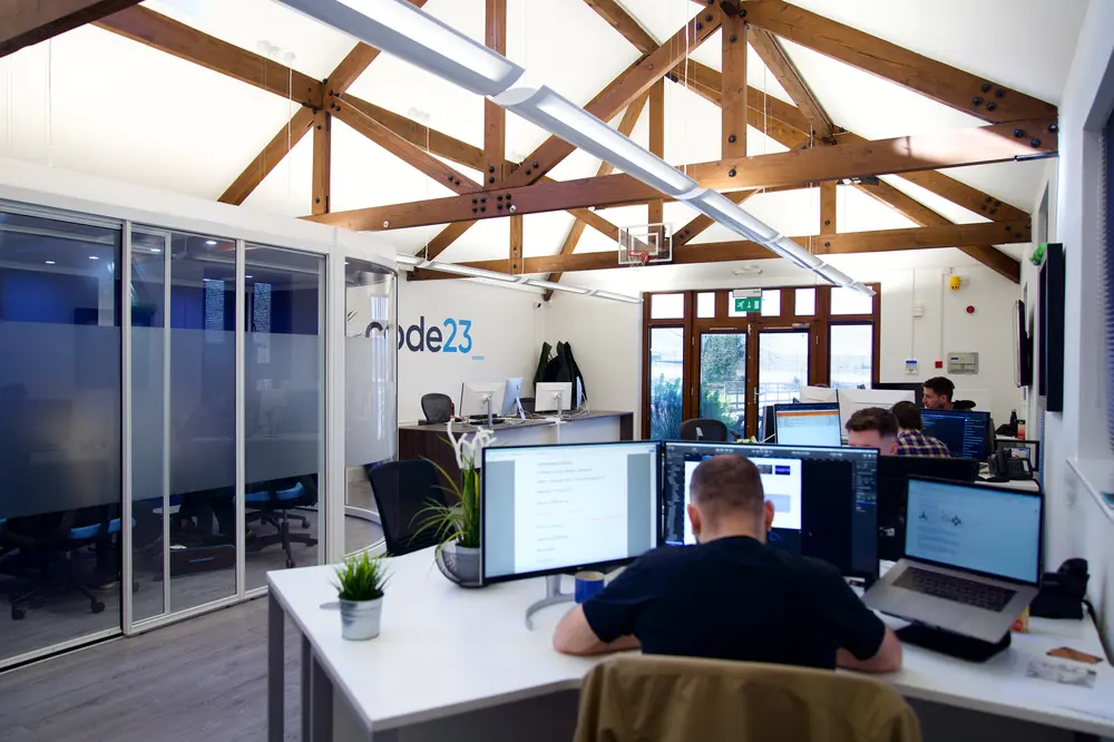 The Code23 team working together in the Reading studio
