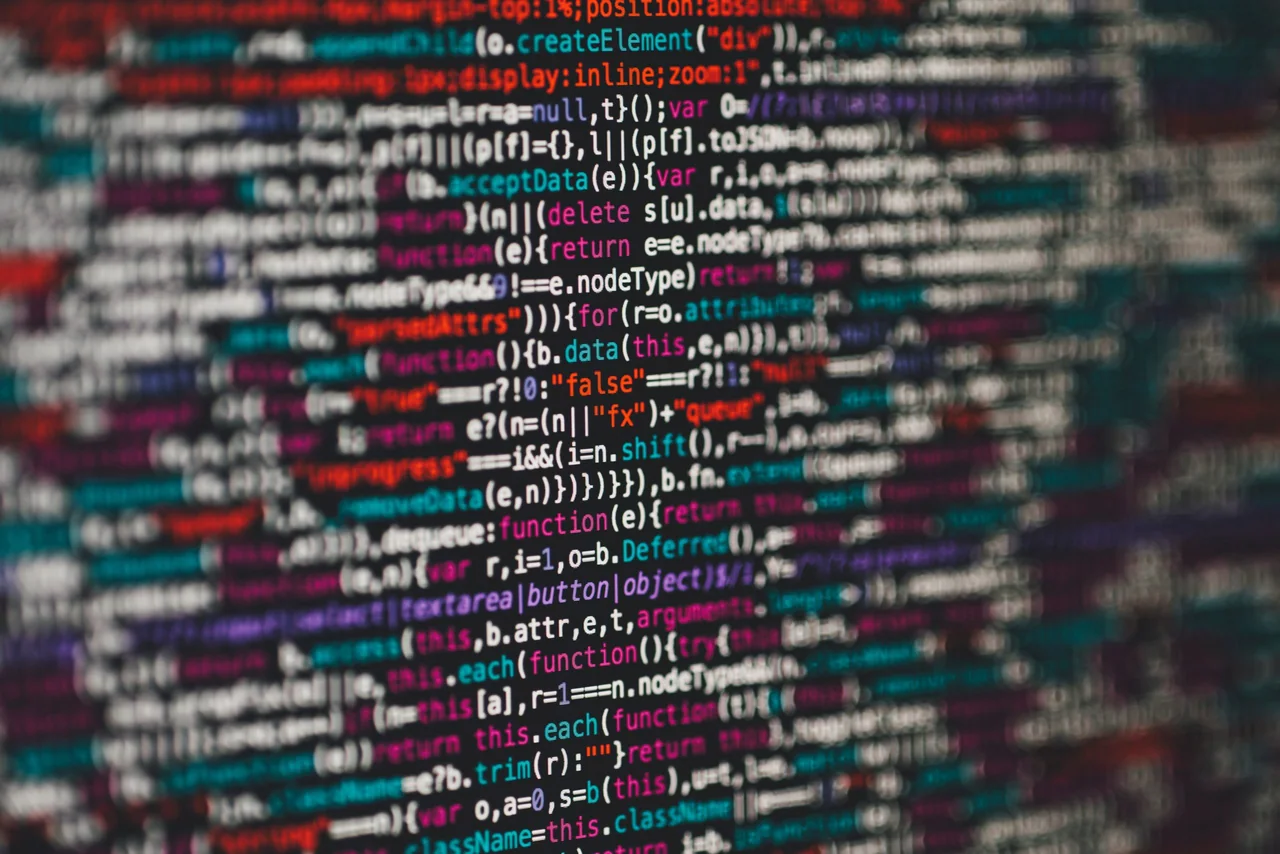 A close-up of colourful JavaScript code on a screen