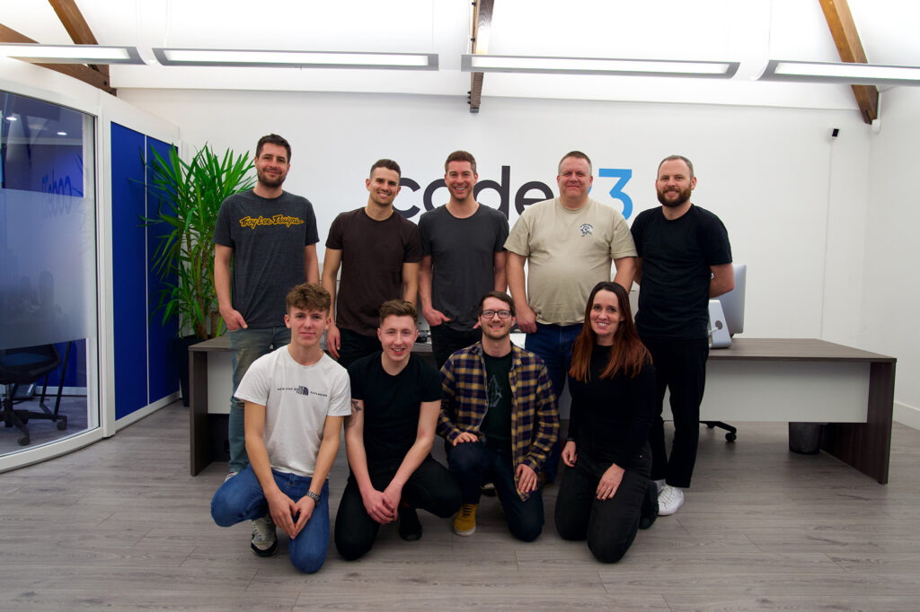 Software development and web design team members.